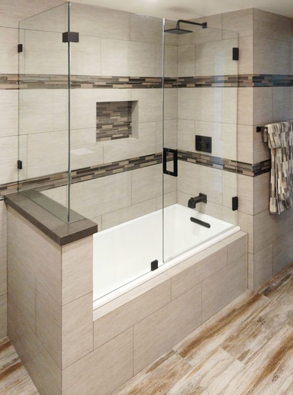 Frameless Glass Shower with a Bathtub